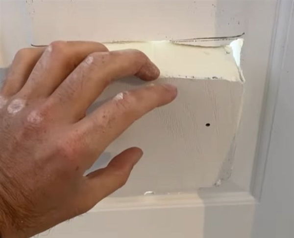Removing the UPVC door section for pet flap hole